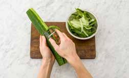 Finely slice the spring onion. Whisk the eggs in a large bowl. Removing the excess moisture from the zucchini is important to ensure your fritter batter is the right consistency and not too wet.