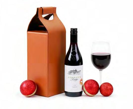 RED indulgence $25 5 A rich bottle of Shiraz presented in a glossy wine carry case Keenan s