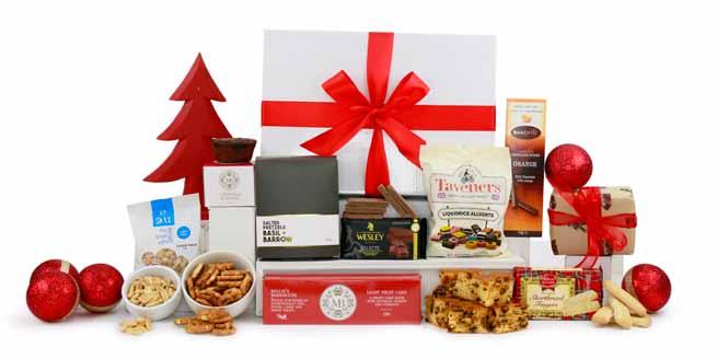 6 TREATS glaore $35 A festive filled hamper with a perfect selection of gourmet treats, presented in a glossy gift box with tissue and decorative ribbon Highland Speciality Tray Baked Shortbread