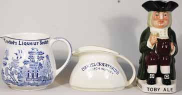 410 411 412 413 414 415 416 417 418 405. CRAWFORD S 2 4.25ins tall, blue print on pale blue background, DANIEL CRAWFORD S SCOTCH WHISKY to sides, with white handle. Made in England pm.