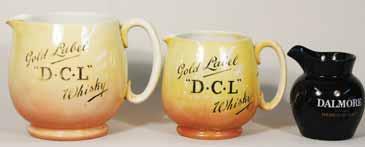 5ins tall, black print DCL GOLD MEDAL SCOTCH WHISKY to sides, Royal Doulton pm, light crazing, R$225 (250-300) 429. DAWSONS 1 7.