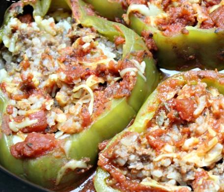 Slow Cooker Stuffed Peppers 4 green bell peppers 1.2 lb. ground turkey 1 can crushed tomatoes (32 oz.) 1/4 cup chopped onion 1 1/2 cups cooked rice 1 Tbsp dried basil 2 tsp seasoned salt (divided) 1.