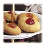 52 > HOME BAKING biscuits > 53 thumbprint cookies Cooking time: 12 minutes - Preparation time: 25 minutes > 185 g/6 oz butter, softened > 1 /2 cup/45 g/1 1 /2 oz icing sugar, sifted > 1 teaspoon