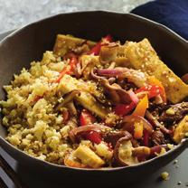 CAULIFLOWER RICE WITH TOFU VEGGIE STIR-FRY Servings: 4 Prep Time: 15 minutes Cook Time: 30 minutes INGREDIENTS 1 package (440 g) fi rm tofu, drained, cut crosswise into 8 pieces and blotted dry with