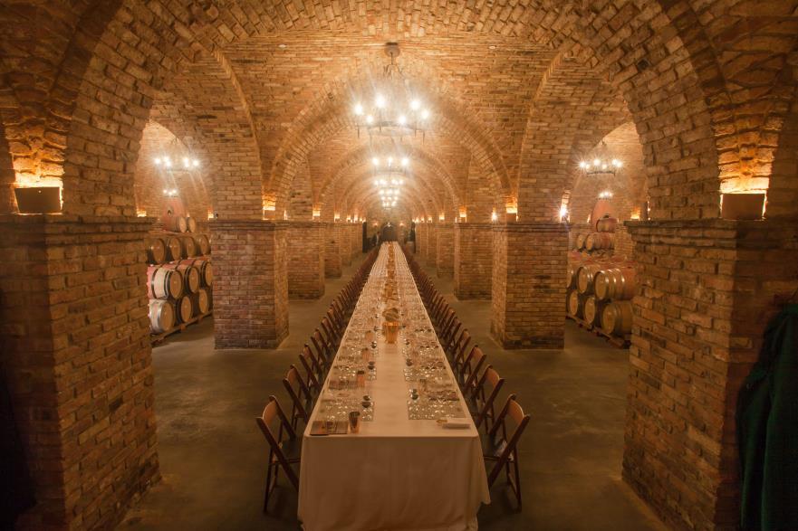 This room includes a 40 foot, hand crafted travertine tasting bar and is our largest room for entertaining perfect for your large event!