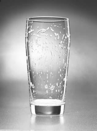If the glass still has an invisible film, water will break up into droplets on the inside surface. 2.