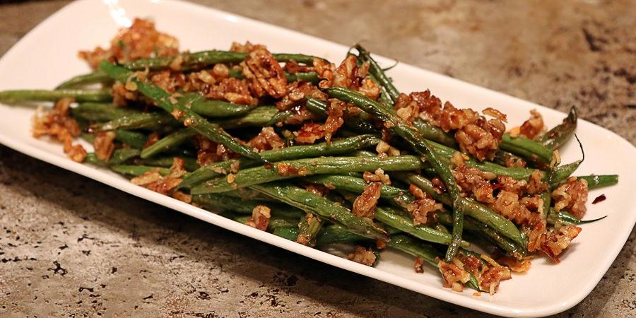 Roasted Pecan Green Beans Yields 3 total servings. Each serving comes out to 182 Calories, 16.8g Fats, 3.3g Net Carbs, and 3.7g Protein. [Freeze Leftovers] Ingredients 1/2 Pound Green Beans 2 Tbsp.