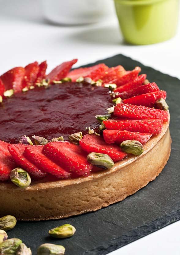 A deliciously light and fabulous looking tart that s packed with strawberry goodness and a hint of crunchy pistachio in every mouthful.