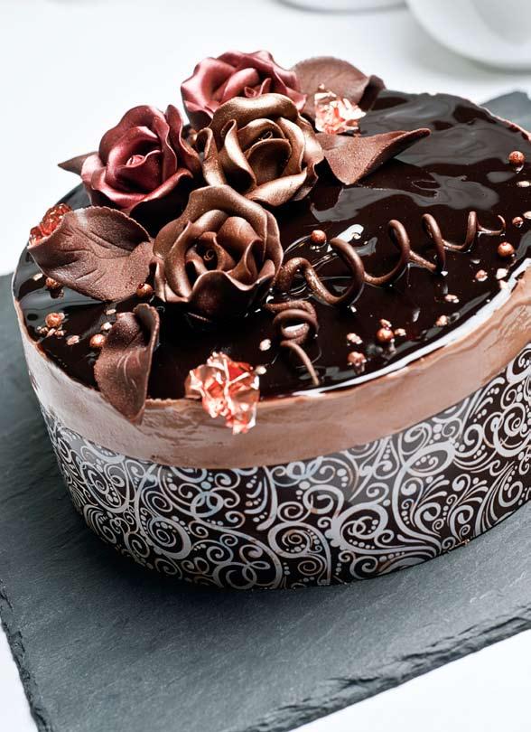 Packed with dark, milk and white chocolate, this gateau is, quite simply, pure indulgence.