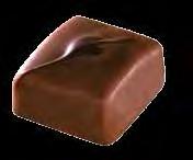Decorated with a dash of dark chocolate An intensely nutty flavor with toasted notes ALMOND PRALINE Decorated with