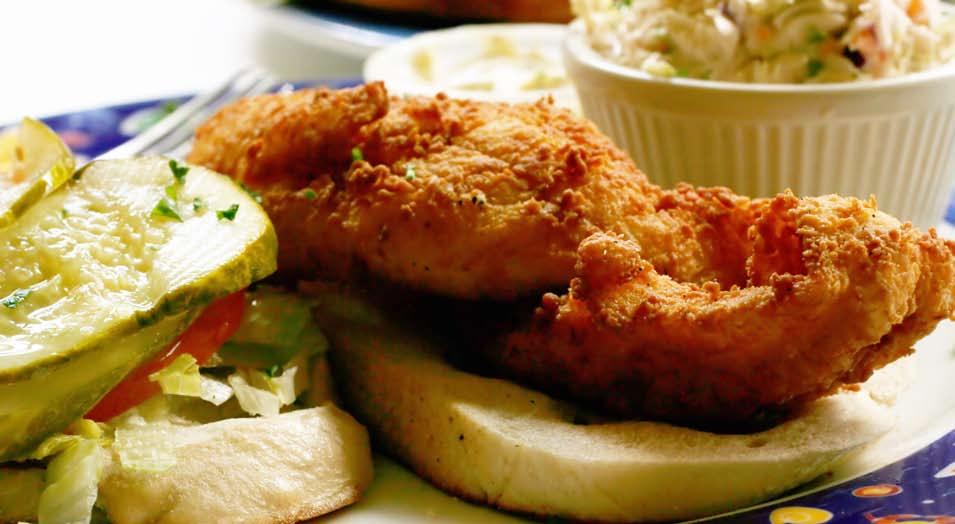 ...at prices that won t sink you! handhelds Shrimp Po Boy Fried local shrimp served on a fresh baked toasted Po Boy roll with lettuce, tomato, housemade pickles and lemon-dill tartar sauce 11.