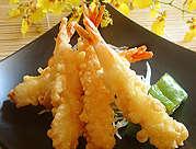 Boom-Boom Shrimp $9.00 Crispy tempura-style shrimp tossed in creamy spicy boom-boom Crispy Calamari $7.00 Deep fried fresh calamari, served with sweet and chili Coconut Shrimp $8.