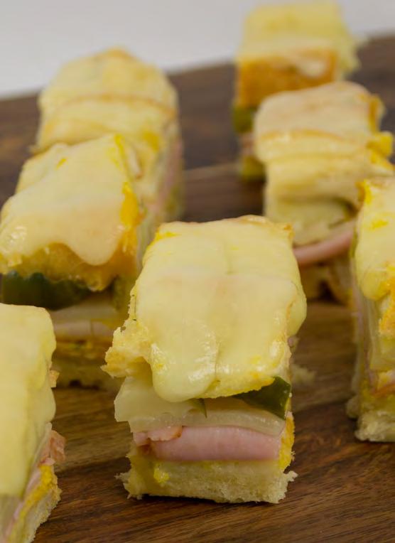 Appetizers The Mini Cuban Stack Texas Toast, Cuban Bread, or Italian Bread Mustard Sliced Pork Sliced Ham Pickle Swiss cheese After slicing into stacks,