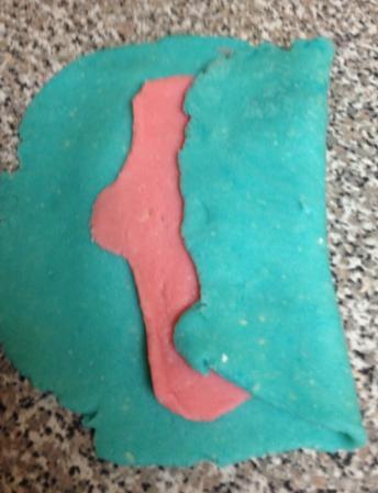 Creating Layers: An Experiment I made two different colors of play dough and split each color in