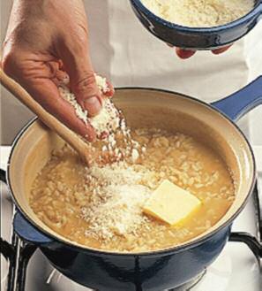 simmer while stirring in hot flavorful liquid (usually a combination of stock and wine) in small increments until the rice is tender.