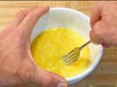 Then gently pull apart the shell to release the egg white and yolk into the bowl.