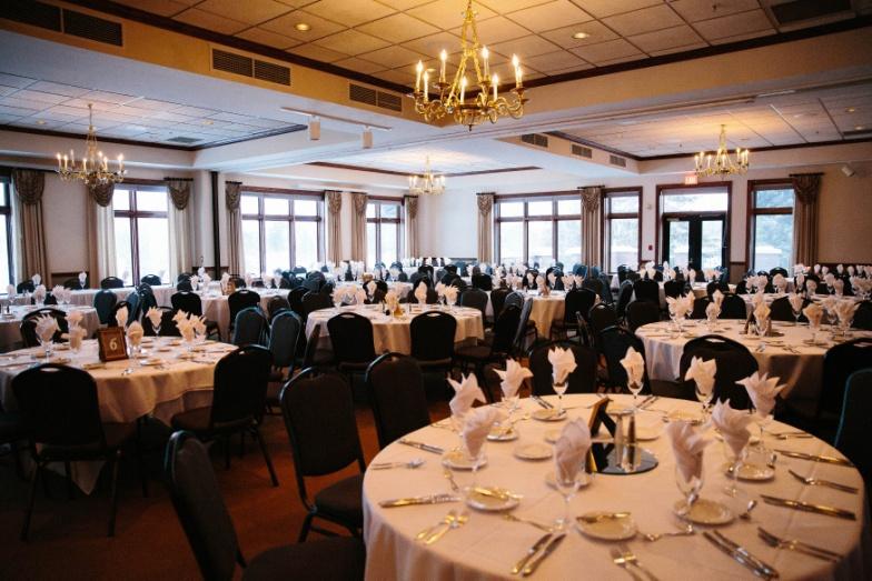 Our stunning ballroom includes drop down ceilings with breathtaking gold chandeliers and large windows overlooking our fantastic golf course.