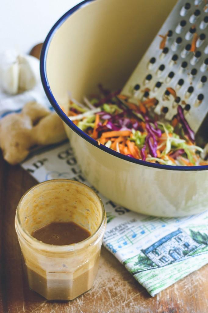 Spicy Coleslaw with Spicy Peanut Dressing salad ingredients: shredded cabbage, white and red shredded carrots spicy peanut dressing: 2 tbsp peanut butter 1 tsp sesame oil or