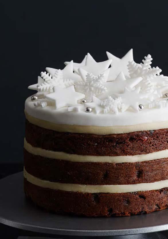 Snow Scene Christmas Layer Cake SERVES: 18 PREP: 10 MIN COOK: 12 MIN DIFFICULTY: EASY A rich almond and vanilla brandy fruit cake is loaded with spice-soaked fruits and sandwiched between gorgeous