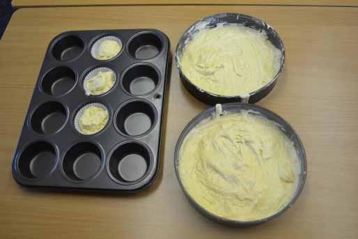 Our cakes were ready to go into the oven. We placed a small amount of the mixture in three small muffin cases as we wanted to show you our Fairy Buns too.