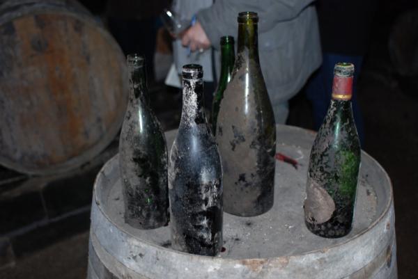 A lot of old, moldy bottles also age