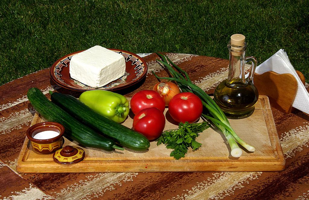 TRADITIONAL BULGARIAN CUISINE RECIPE SHOPSKA SALAD needed products Compulsory components of the Shopska Salad are tomatoes (400 g) and cucumbers (250 g).