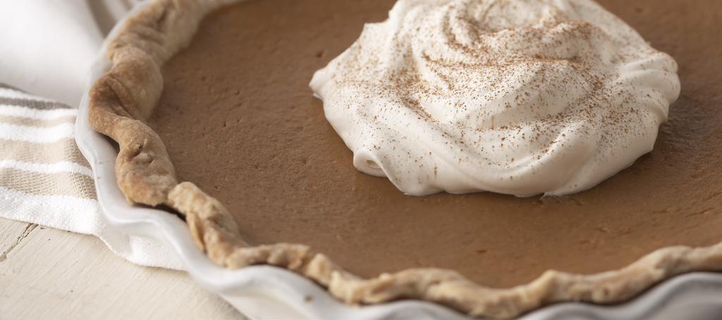 PUMPKIN-MAPLE PIE SERVINGS PER RECIPE: 8, CARB GRAMS PER SERVING: 32 1 recipe Lower-Fat Oil Pastry (see below) 1 15-ounce can pumpkin ½3 cup maple-flavored ¾ cup refrigerated or frozen egg product,