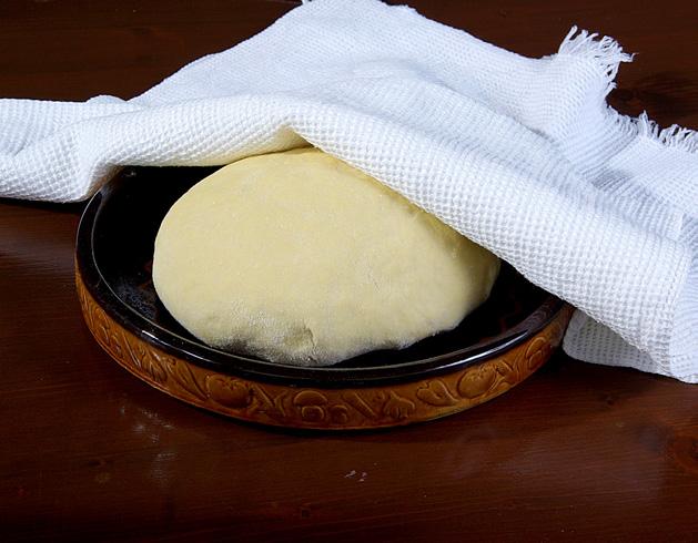 Cover the dough with a towel and leave