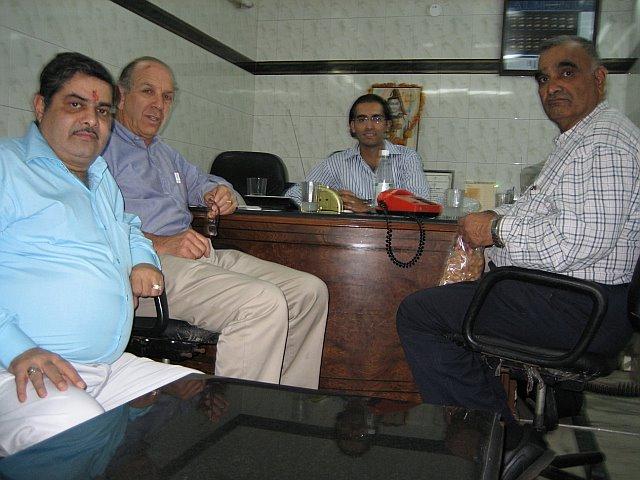 Kush Bhatia (center) with customers
