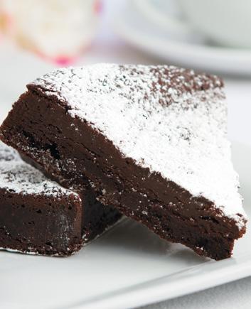 Sliced & Individual Cakes Flourless Chocolate Flourless Chocolate Rich, thick chocolate cake, topped with powdered sugar Chocolate