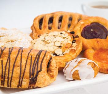 Breakfast Items Plain Croissant Buttery, flakey croissant Almond Croissant Sliced almonds and powdered sugar, sprinkled on top of a flakey croissant Chocolate Croissant Chocolate drizzled on top of a