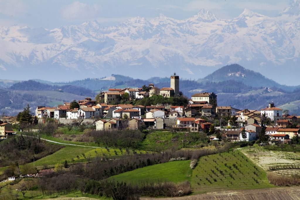 (B) Day to Day Trip Summary A cheese market in Alba The Langhe is dotted with quaint, hilltop villages The Highlights and Special Features of Your Trip Spend a week on The Langhe the picturesque,