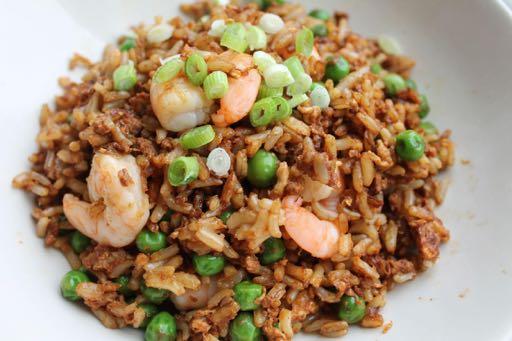 ONE POT MEAL EASY EGG FRIED RICE 1 Pouch MicrowaveRice 1 Tbsp Soy Sauce 2 Tsp Sesame Oil 1 2 tsp Chinese 5-Spice (Optional) 1 Tbsp Minced Garlic 3 Spring Onions 2 Eggs 100g Frozen Peas 150g Frozen