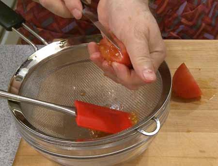 3 3 After peeling and discarding the skin, you can cut each tomato in half, through the middle (or