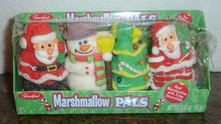 I found these little Marshmallow edible figurines at the Wal-Mart. They are exactly the right size to be scaled for the house!