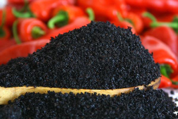 ISOT BLACK CHILI CRUSHED The isot pepper is grown in the southeast of Turkey, it is a vibrant ruby-red capsicum (like an elongated bell pepper), with an incredibly sweet flavor and quite a subtle