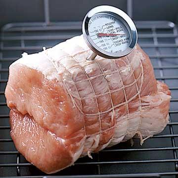 Meat Thermometer A short metal probe with a gauge, which is inserted into food and instantly indicates the food's internal temperature. This tool is used to determine a food's (roast, bread, etc.