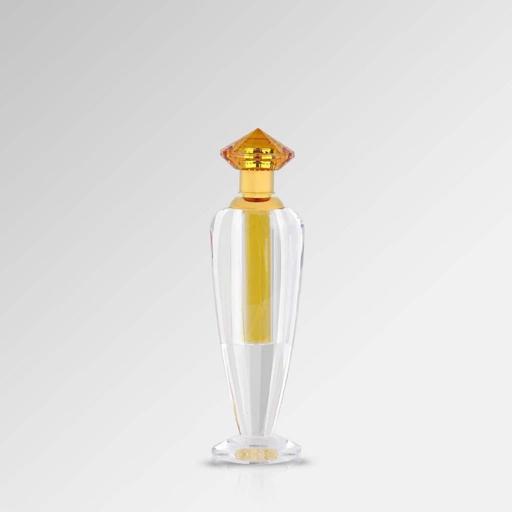 AQAMAAR The fragrance is encapsulated in a signature crystal bottle, radiating its opulence through all its facets inviting you to imbibe the allure.