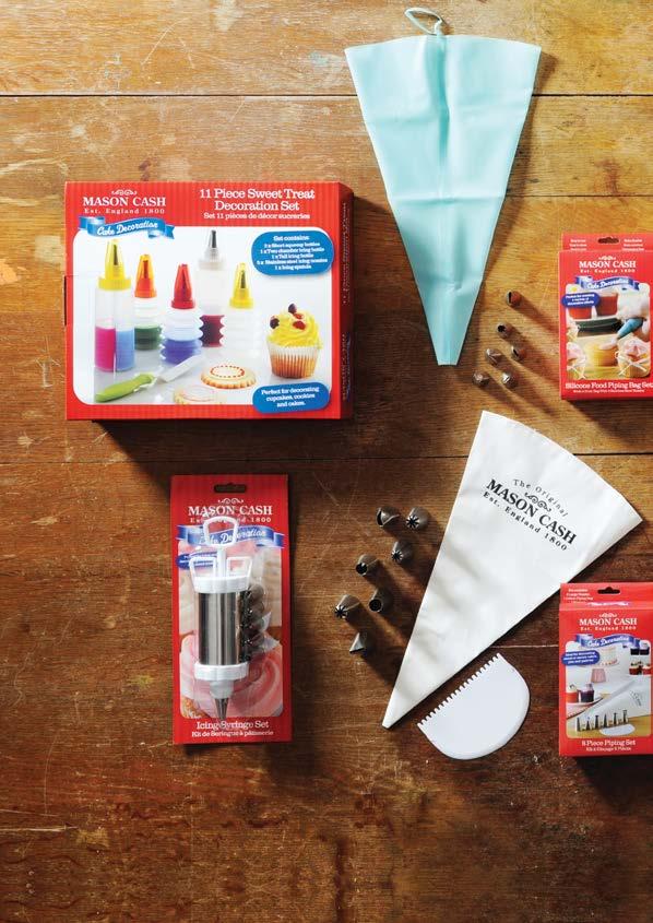 3 1 2 4 1 11 Piece Sweet Treat Decorating Set Contains 3 Squeeze bottles, dual piping bottle, tall piping bottle, spatula and 5 stainless steel nozzles. Gift box. 2007. 967 Ctn.