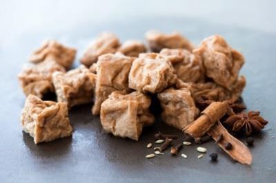 We hand cut Hodo Firm Tofu into cubes, fry, and then braise them in a tamari-based organic apple cider with an Asian five-spice blend, making each bite burst with exciting flavors.