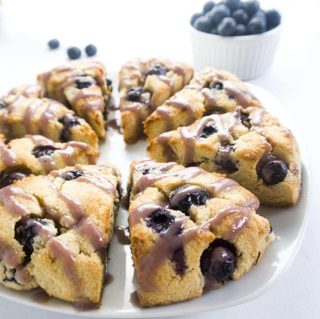 Glazed Blueberry Scones These paleo, low carb scones are bursting with juicy fresh blueberries and topped with blueberry glaze. Scones 1 cup Almond flour 1/4 cup Coconut flour 3 tbsp.
