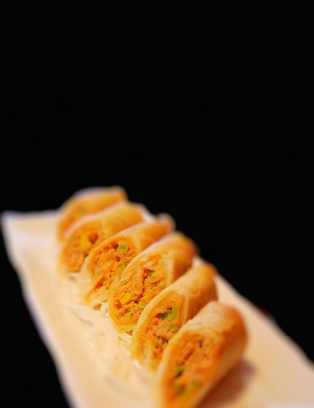 Ahi Tuna Cracker 6 pieces of spicy crispy roll with ahi tuna kabocha and cilantro served with spicy mayo 6.
