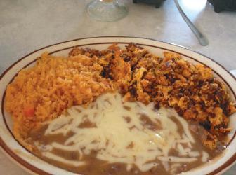 Huevos Rancheros DESAYUNOS/BREAKFAST Served with rice, refried beans and corn tortillas HUEVOS RANCHEROS $6.