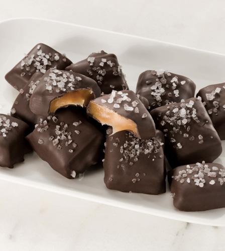 00 Crunchy toffee drenched in milk chocolate, dusted with almond pieces and ready to