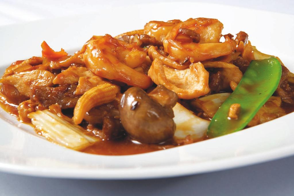 95 Spicy Triple Delight Beef tenderloin, chicken and shrimp simmered in a brown sauce with peanuts 9.