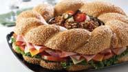 (serves 12-16) $30 The Ring Leader Party Pleaser This artfully arranged sandwich is filled with premium DI
