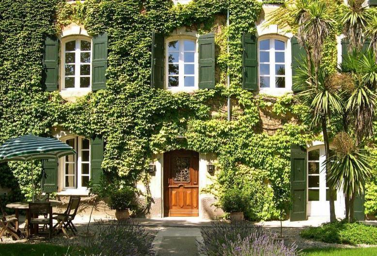 Welcome to the Bastide An antique door opens into to the renovated bastide where you will find a fully equipped kitchen with modern equipment and air-conditioning, a breakfast/dining room with access