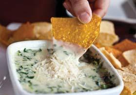 Creamy Artichoke Parmesan Dip SERVES 12 Prep Time: 10 minutes Cook Time: 1½ hours (slow cooker) Serving Size: ¼ cup Calories: 70 Sugars: 1g Carbs: 4g Dietary Fiber: 0g Protein: 3g Cholesterol: 5mg