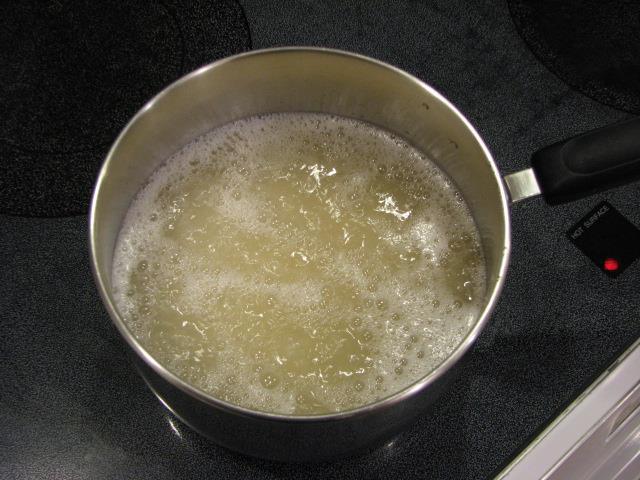 You will know the oil is ready when you dip the end of a roll into the oil and see bubbles forming at the base.