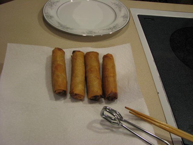 It reviews the most difficult steps involved including, The preparation and filling of the spring roll shells. The rolling and stacking of the shells.